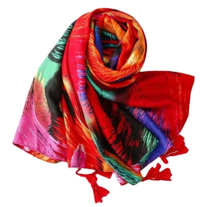 Colorful cotton linen scarf with peacock feather pattern and vibrant red fringe tassels