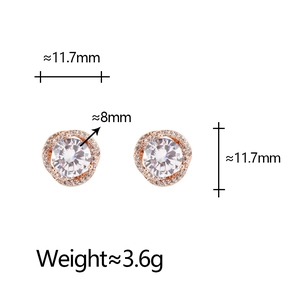 Detailed view of rose gold zircon stud earrings with size measurements and weight info