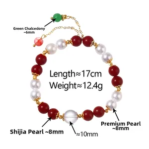 Detail view of red agate and pearl beaded bracelet with 17cm length and weight specifications