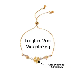 Detailed view of adjustable clover bracelet with cat eye stone and 22cm length spec