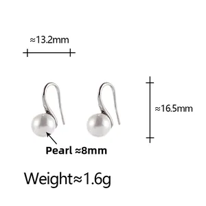 Detail view of shell pearl drop earrings with 8mm pearls and 16.5mm height dimensions