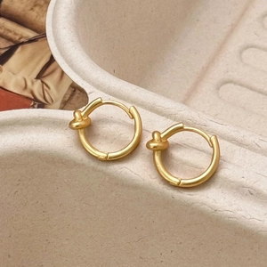Minimalist matte gold knotted hoop earrings for women with elegant twisted rope design