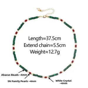 Detail of beaded necklace showing length dimensions with green malachite and red beads