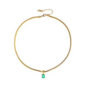 Gold flat snake chain necklace with emerald green crystal pendant in stainless steel