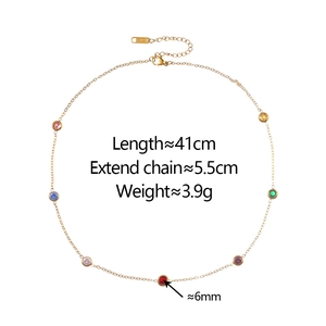 Detail of 18K gold-plated necklace showing measurements, colorful stones and lobster clasp