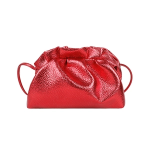 Chic red metallic cloud pouch bag with pebble grain texture and sleek shoulder strap