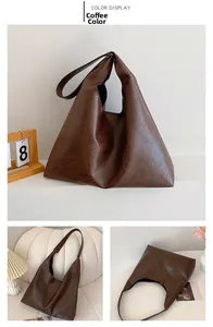 Vue détaillée du grand sac cabas marron foncé en similicuir avec finition lisse cirée