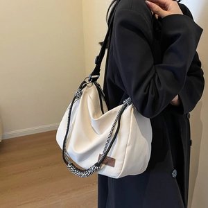 Large capacity off-white canvas tote bag with woven rope strap and leather detail