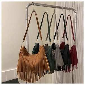 Detail view of large capacity vintage fringe handbags in five different color options