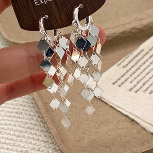 Elegant long silver geometric tassel earrings with glittering rhombus sequins and hoops