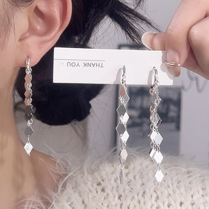 Silver multi-layered geometric rhombus tassel drop earrings with polished metallic finish