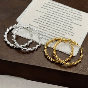 Coffee gold geometric spiral hoop earrings with vintage textured metal design