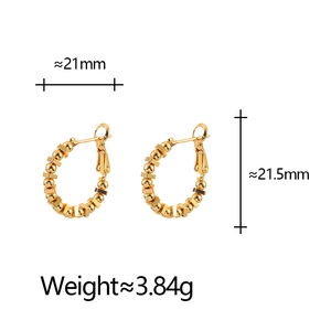 Detail view of gold hoop earrings with size specs 21mm by 21.5mm and 3.84g weight