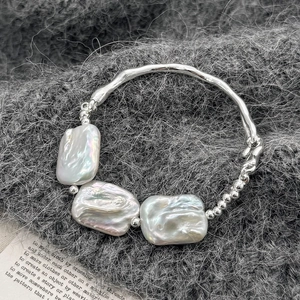 Baroque natural freshwater pearl bracelet with silver textured metal and bead chain