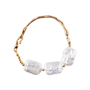 Minimalist baroque freshwater pearl bracelet with irregular gold plated metal frame design