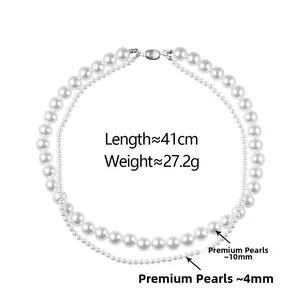Détail du collier double rang avec perles blanches de 10mm et 4mm et fermoir argenté