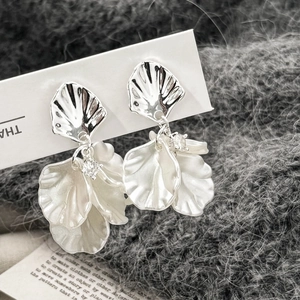Elegant geometric shell flower petal earrings in silver and white with zircon accents