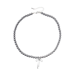 Elegant grey pearl necklace featuring a silver bow pendant and adjustable lobster clasp