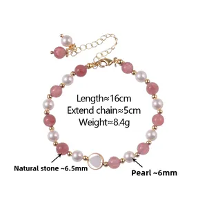 Detail of beaded bracelet with pink natural stones, white pearls and a heart charm