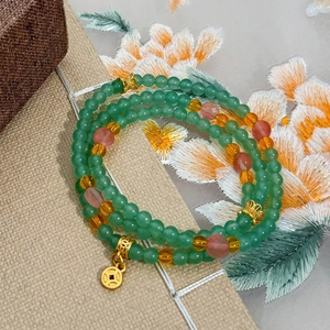 Three-layer green natural stone bracelet with gold coin charm in Neo-Chinese style