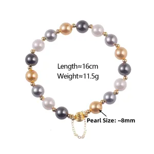 Detail of multi-color 8mm pearls with gold pumpkin beads and adjustable clasp