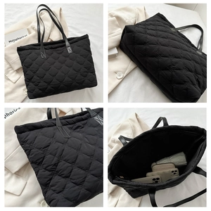 Detailed views of a black quilted puffer tote bag with spacious interior and leather handles