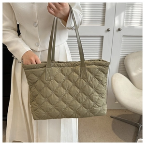 Quilted tote bag in olive green with fine diamond stitching and dual shoulder straps