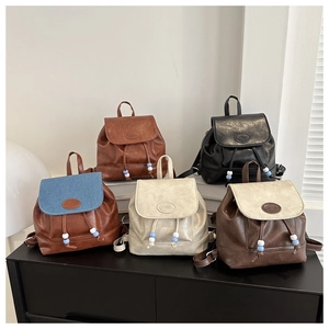 Detailed display of five color options for this mini PU leather fashion backpack