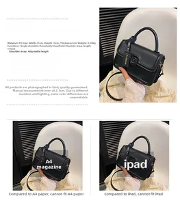 Detailed dimensions of black PU leather handbag with adjustable crossbody strap and charm