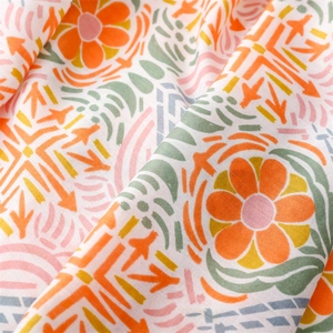 Detail of colorful cotton-linen scarf with vibrant floral and geometric ethnic print