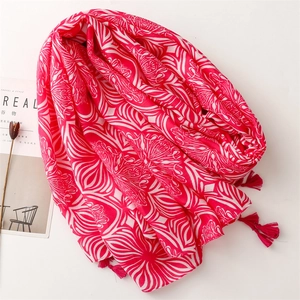 Rose pink and white linen scarf with bohemian floral patterns and tassel details