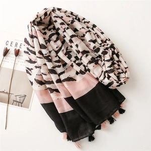 Stylish cotton linen leopard print scarf for women featuring pink and black fringe tassels