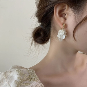 Elegant white petal tassel earrings with layered texture and gold metal accents for women