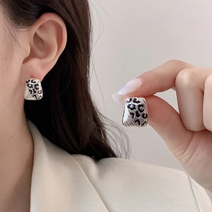 Geometric trapezoid earrings with leopard print and 14k gold plating for a luxury look