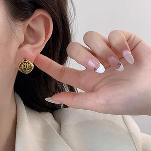Retro square leopard print earrings with gold-plated metal borders shown on model