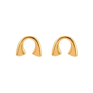 Detailed view of U-shaped gold earrings with polished mirror finish and minimal design