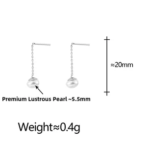 Macro detail of high-luster button pearl earrings with precise 5.5mm size and 20mm length