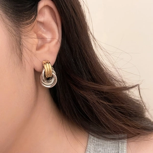 Chic multi-layered interlocking twisted gold and silver hoop earrings for women