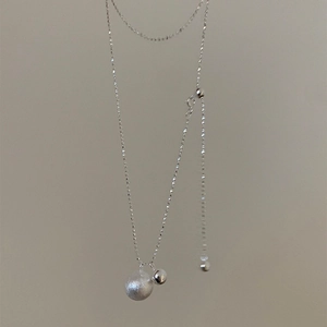Elegant silver adjustable necklace featuring matte and polished double ball pendants