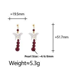 Detailed view of long butterfly earrings with red pearls, dimensions and weight details
