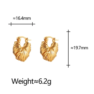 Detailed view of gold twisted hoop earrings with precise 16.4mm width measurements