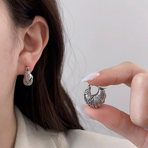 Silver woven textured croissant hoop earrings with elegant irregular metallic lines for women