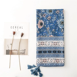 Blue porcelain style ethnic scarf with floral patterns and blue fringe tassels