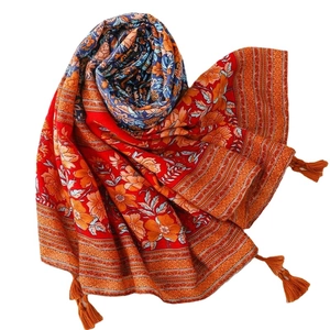 Ethnic style red shawl with blue floral pattern and woven fringe for travel