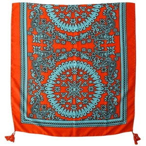 Bohemian orange and blue paisley travel shawl with tassels for ethnic vacation style