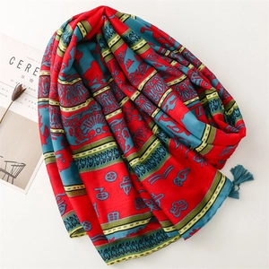 Ethnic printed scarf shawl in red and blue with fringe tassels and geometric patterns
