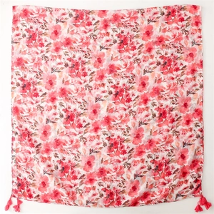 Close-up of floral print cotton-feel scarf with pink tassel fringe details