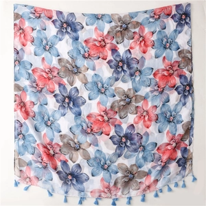Écharpe châle sensation coton-lin avec imprimé floral, pompons bleus et motif élégant