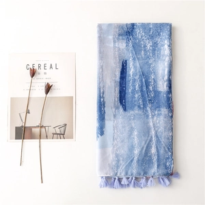 Blue and white gradient satin cotton scarf with tassels and artistic watercolor pattern