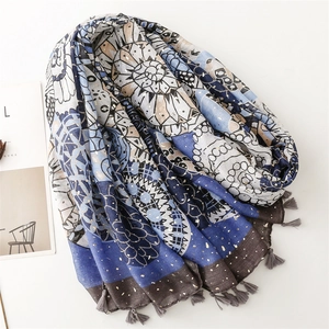 Blue geometric mandala pattern scarf with gold foil accents and grey fringe tassels